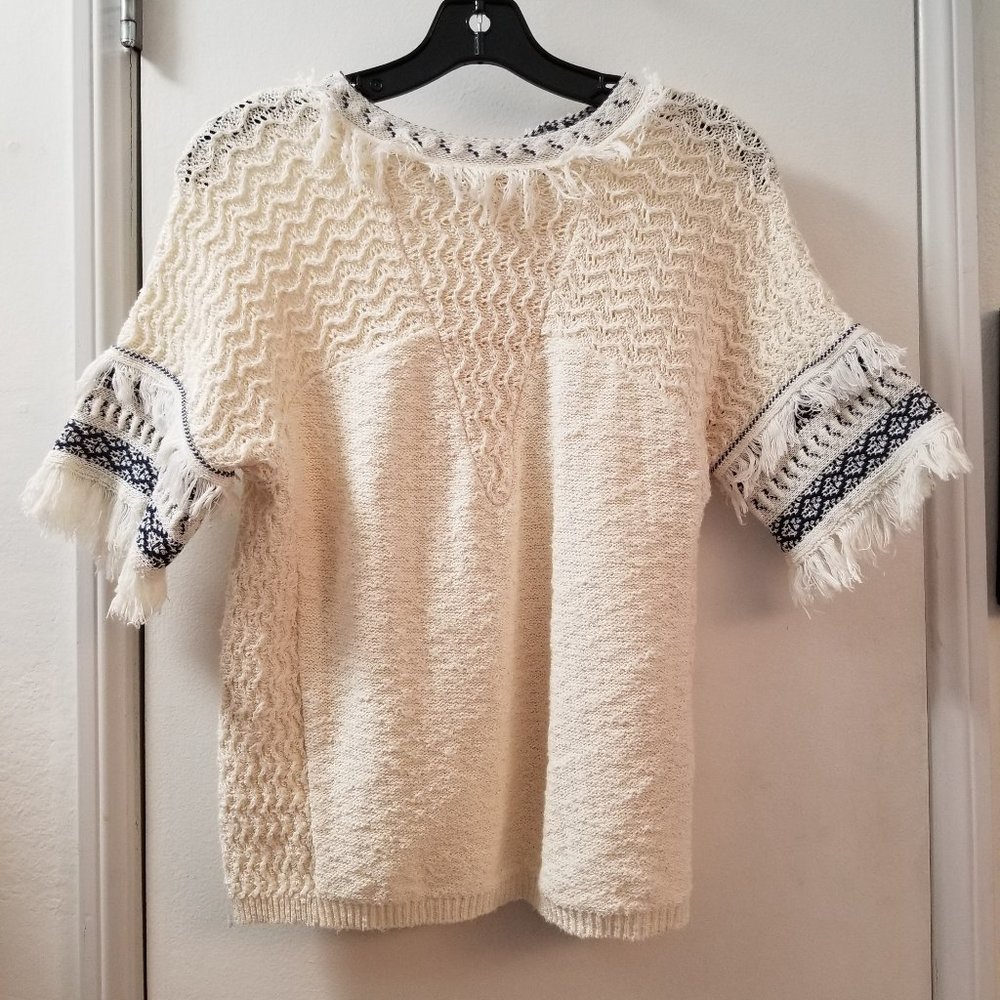short sleeve sweater knit top with fringe on neck and sleeves